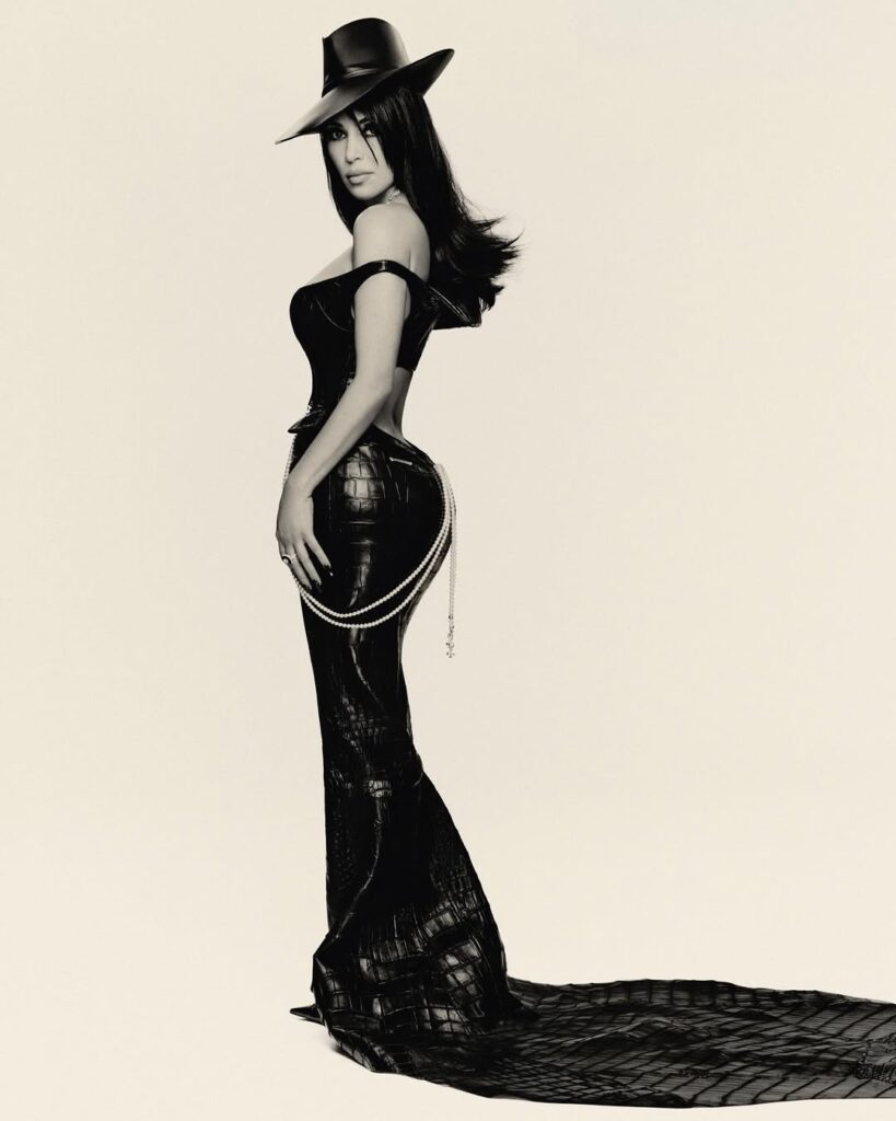 Kim Kardashian stuns at Met Gala 2025 in a custom Chrome Hearts leather look, sharing behind-the-scenes glam with daughter North West on Instagram.