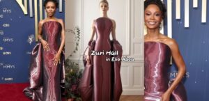 zuri hall models her gown on the red carpet of emmys